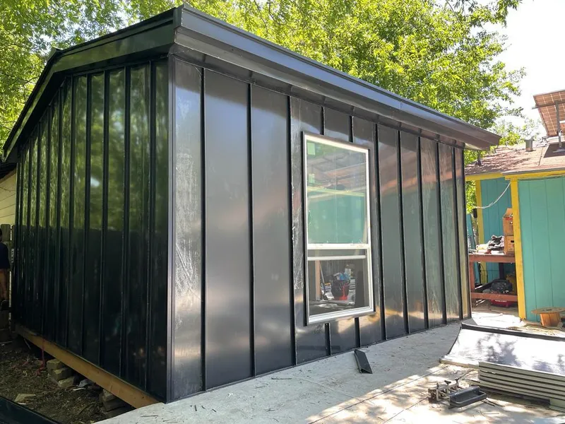 Black standing seam metal wall panels for Metal Roof Installation in Boulder Hill