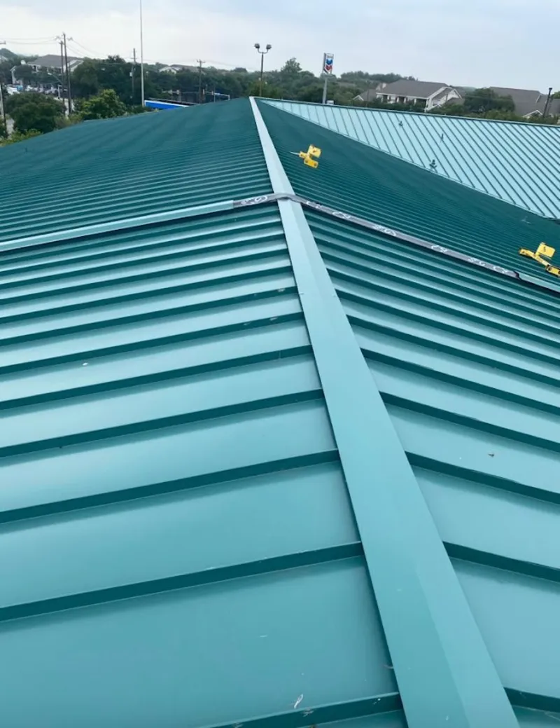 Green commercial metal roof ridge and valley for Metal Roof Repair in Boulder Hill