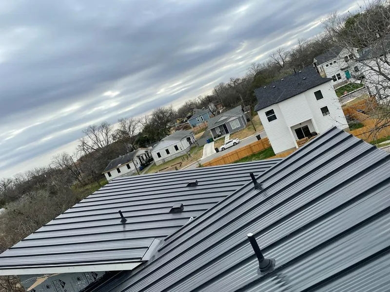 Standing seam metal roof panels with vents for Skylight Repair in Boulder Hill